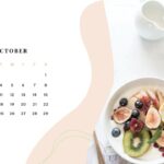 October 2022 Calendar with image of fruit salad in corner