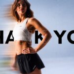 Decathlon Thank You Template - Full-bleed closing slide with oversized black typography and motion-blur Kiprun runner