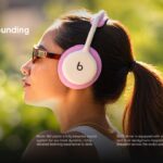 Beats 360 Custom Acoustic Sound Quality Template - Woman wearing pink headphones against lush green bokeh with bold white headline overlay